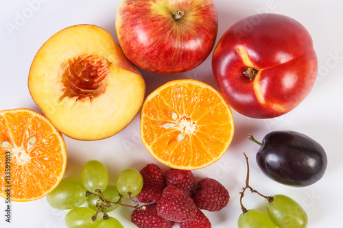 Fresh ripe fruits on white background