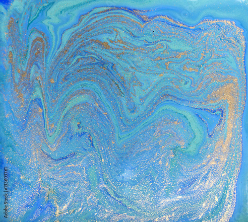 Blue and golden marbled liquid texture