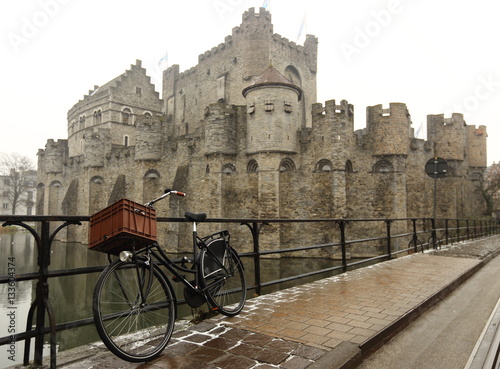 Bicycle parked at Medieval castle Gravensteen (Castle of the Counts) in Gent, Belgium