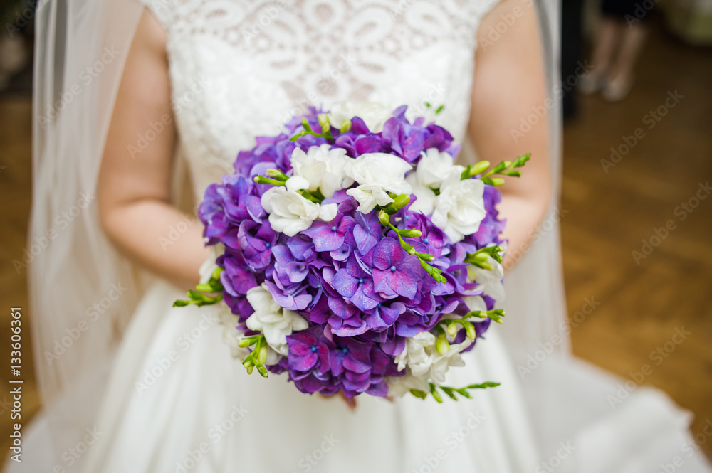 Beautiful bride and groom with bouquet before wedding ceremony Beautiful bride and groom with bouquet before wedding ceremony