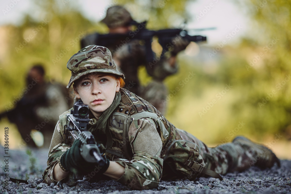 Fototapeta premium Special forces soldiers with weapon take part in military maneuv