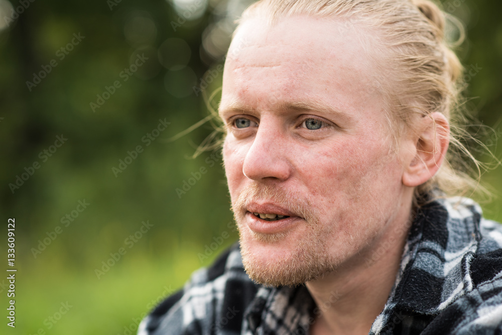 Portrait of a male hipster outdoors. Close-up Portrait of a male hipster outdoors. Close-up