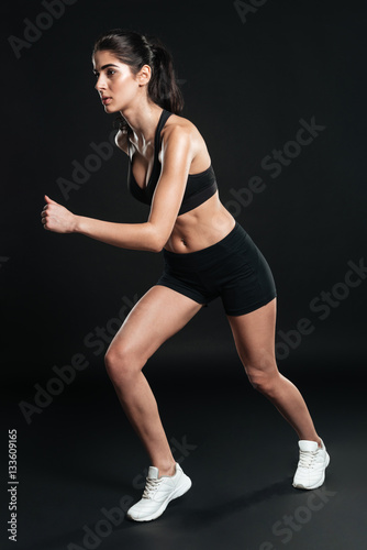 Full-length photo of running woman