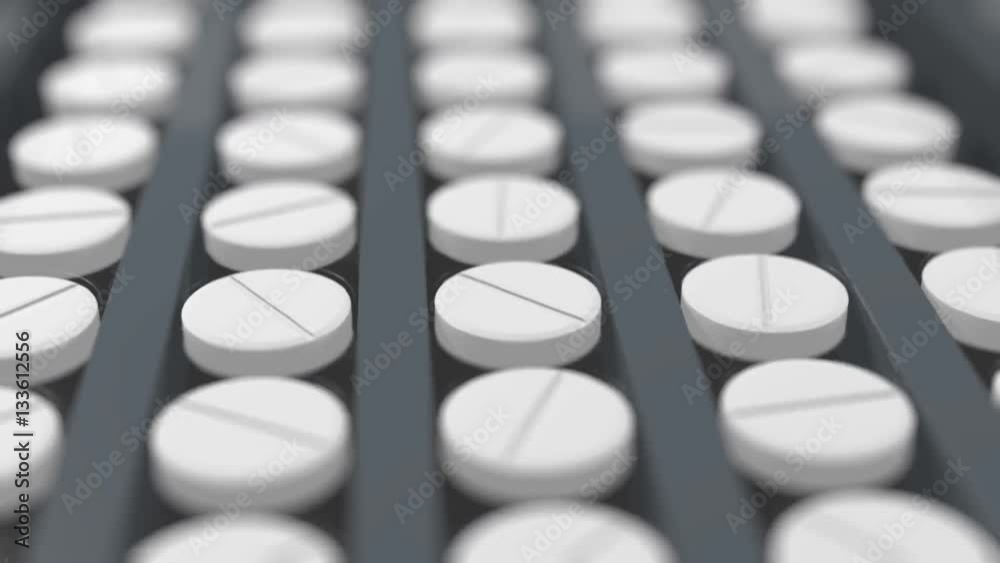 tablets on a conveyor line tablets on a conveyor line