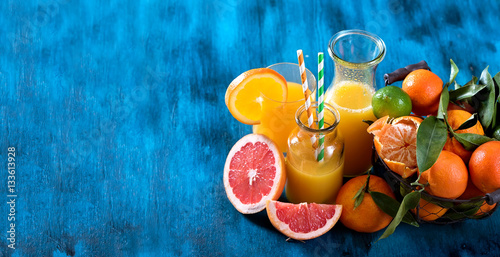 Citrus juice, healthy drink with fresh fruits. Refreshing lemona photo