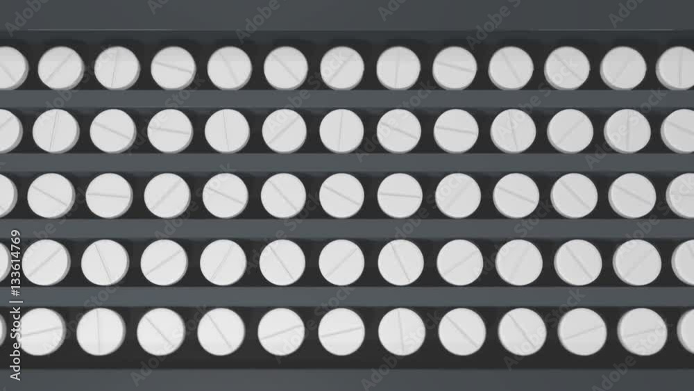 tablets on a assembly line with the top view tablets on a assembly line with the top view