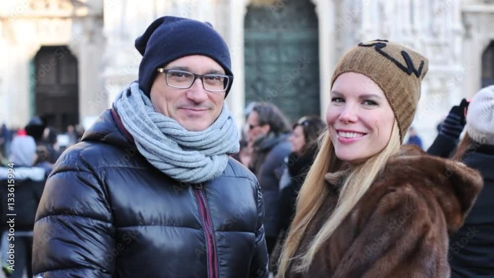 Happy couple in love in the center of Milan, Italy