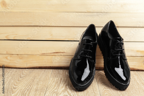 women shoes on wooden background © fotofabrika