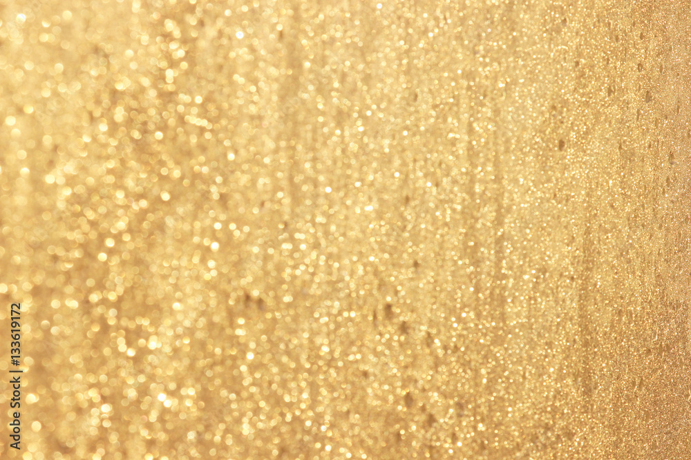 Abstract gold glitter background. Twinkled texture. Bokeh lights Abstract gold glitter background. Twinkled texture. Bokeh lights
