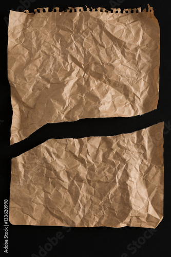 old paper sheet isolated on black background