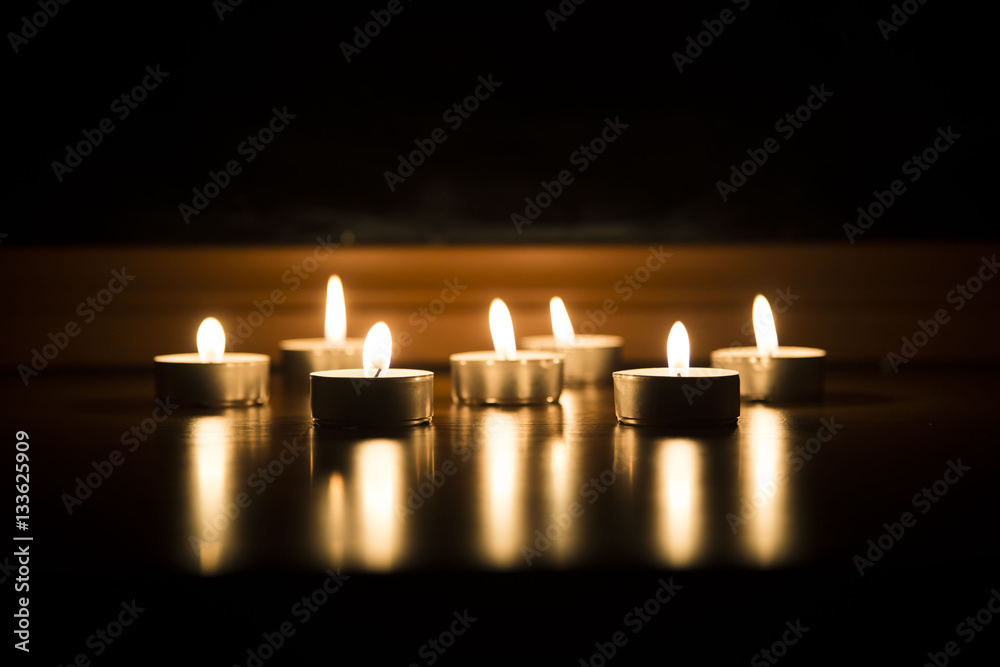 candles and a glass of wine home evening