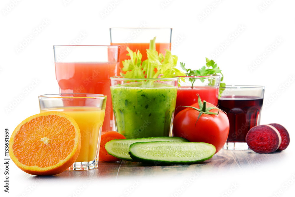 Glasses with fresh organic vegetable and fruit juices Glasses with fresh organic vegetable and fruit juices