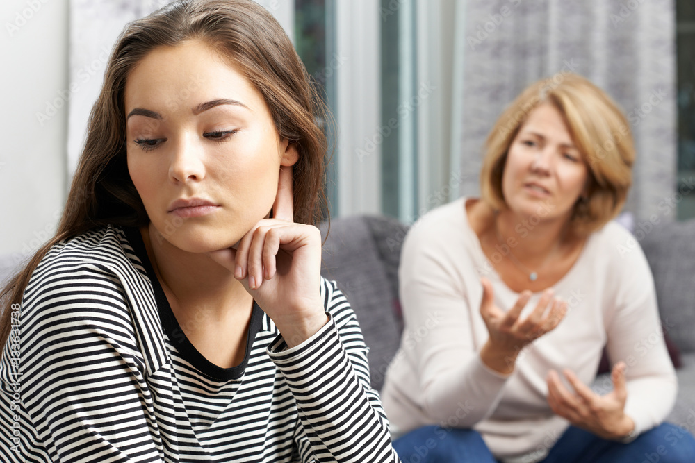Bored Teenage Girl Being Told Off By Mother Bored Teenage Girl Being Told Off By Mother
