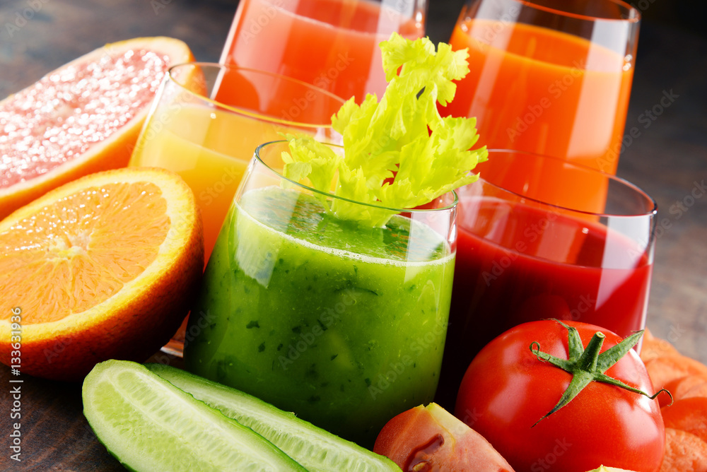 Glasses with fresh organic vegetable and fruit juices Glasses with fresh organic vegetable and fruit juices