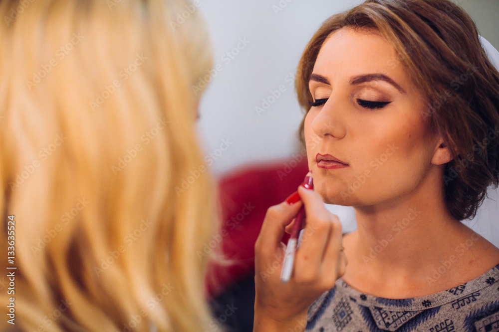 Bride is doing a makeup for the wedding Bride is doing a makeup for the wedding