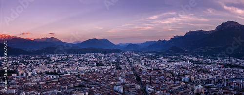 Panoramic view of Grenoble city after sunset photo