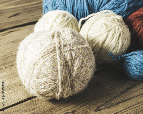 Ball of Yarn on wooden table.