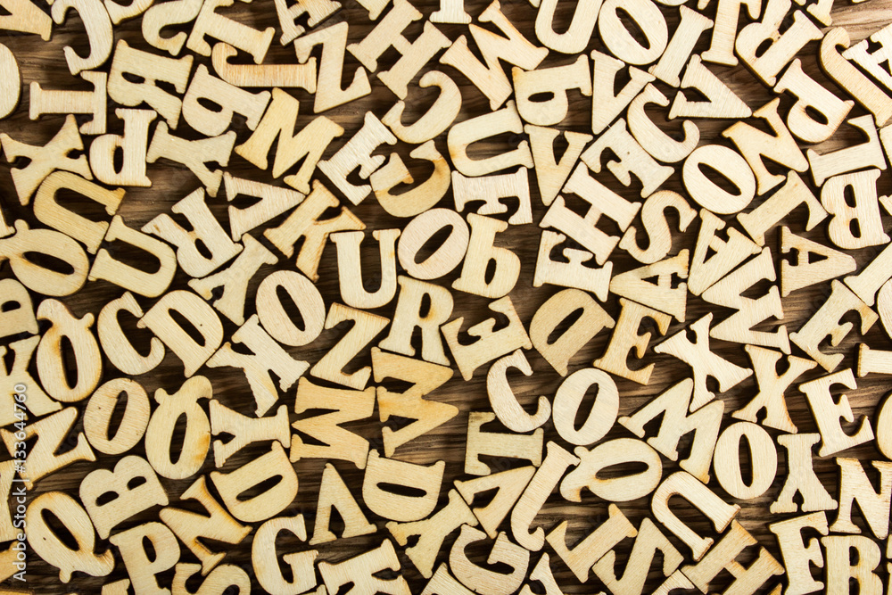 Close-up Letters of the alphabet made of wood for background