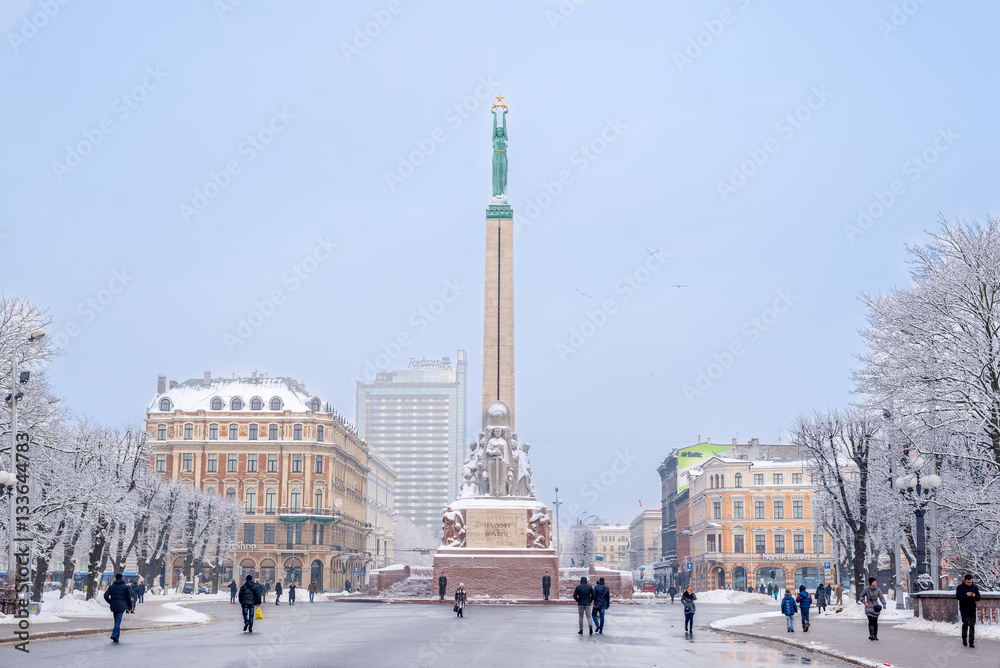 Winter landscape monument of freedom in cold and snowy day