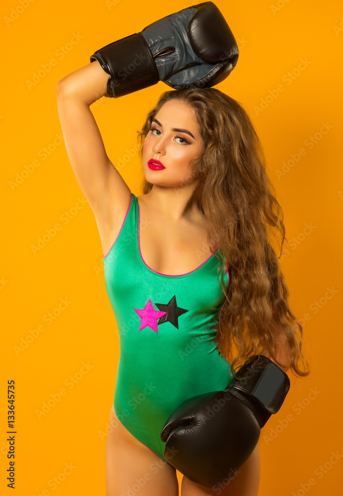 beautiful girl in boxing gloves and sport kombidresse beautiful girl in boxing gloves and sport kombidresse