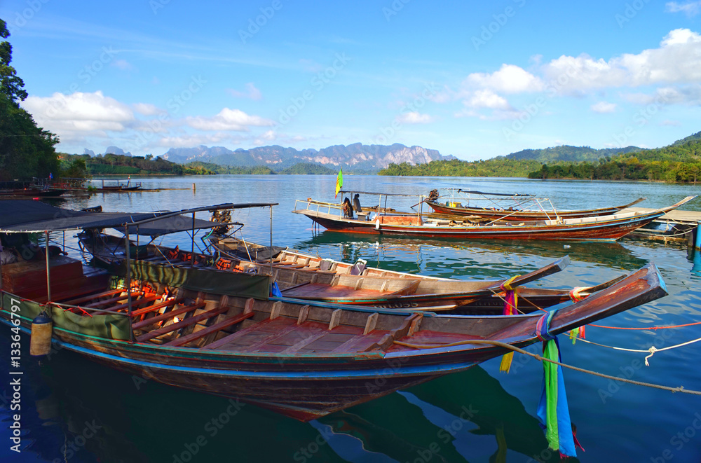  Port midst Beautiful mountains, lakes, rivers, sky and natural attractions in the dam Rajjaprabha the Khao Sok National Park in Surat Thani, Thailand.