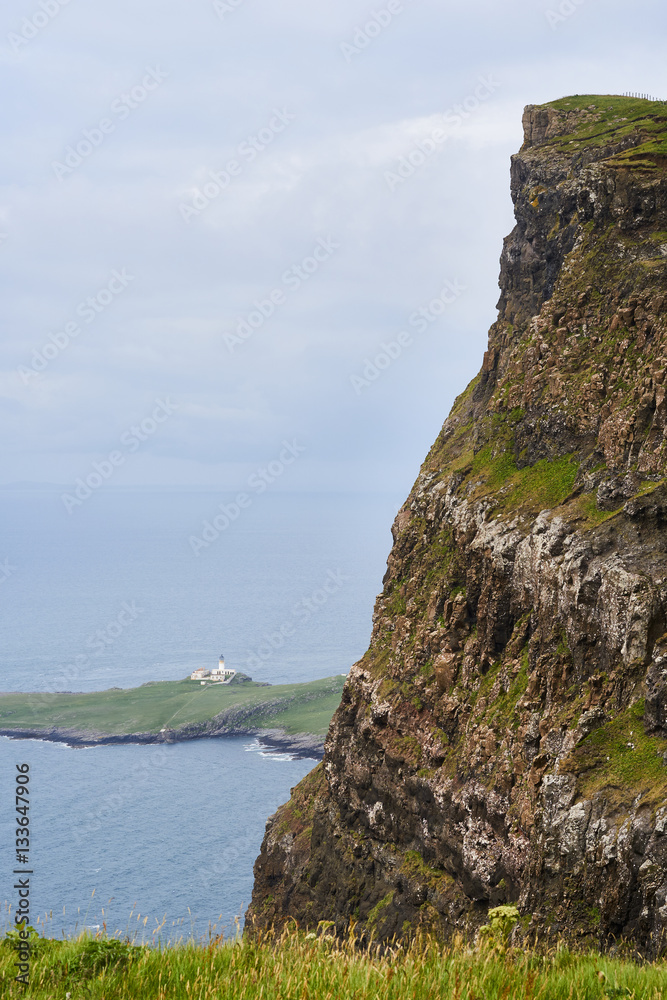 Looking down onto Neist Point lighthouse  from Ramasaig cliffs near Dunvegan on the Isle of Skye, Scotland, UK.      