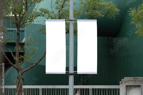  Large blank billboard on a street wall,  banners with room to add your own text