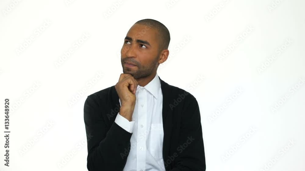 Smiling young african man in formalwear having an idea and showing okay gesture while standing isolated on white background Smiling young african man in formalwear having an idea and showing okay gesture while standing isolated on white background