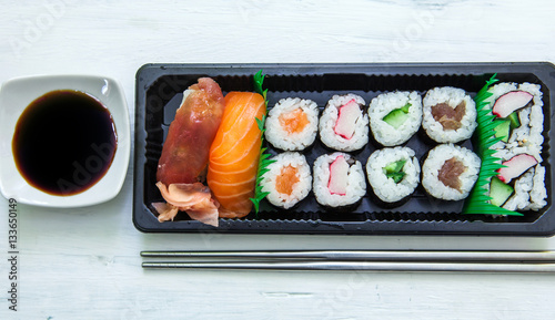 Sushi box with chopstick photo