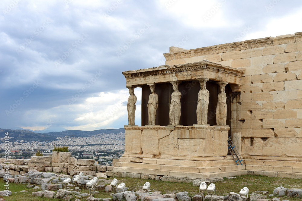 caryatids against dramatic sky, Athens