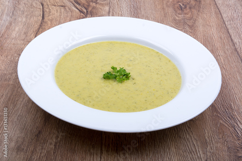 Cream of broccoli soup on a plate