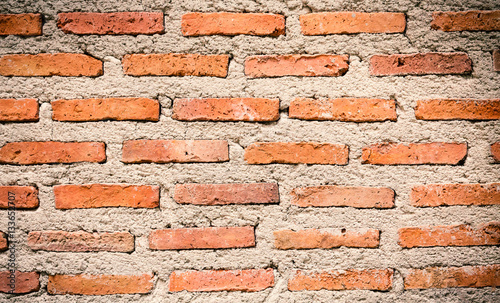 Brick wall pattern of the house for texture and background.