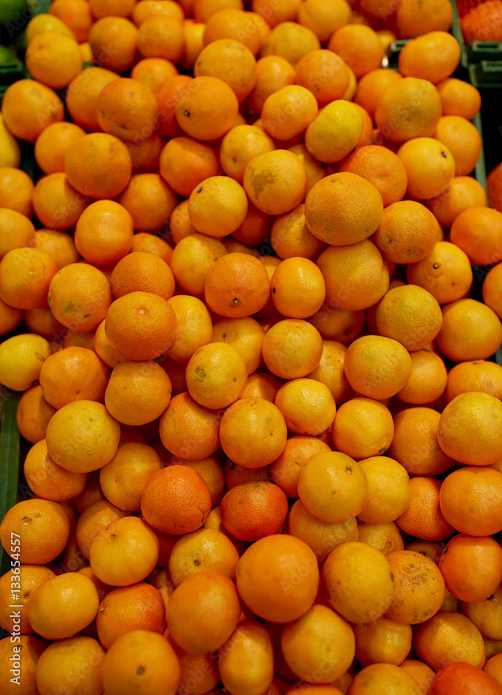 ripe mandarins at grocery store or market