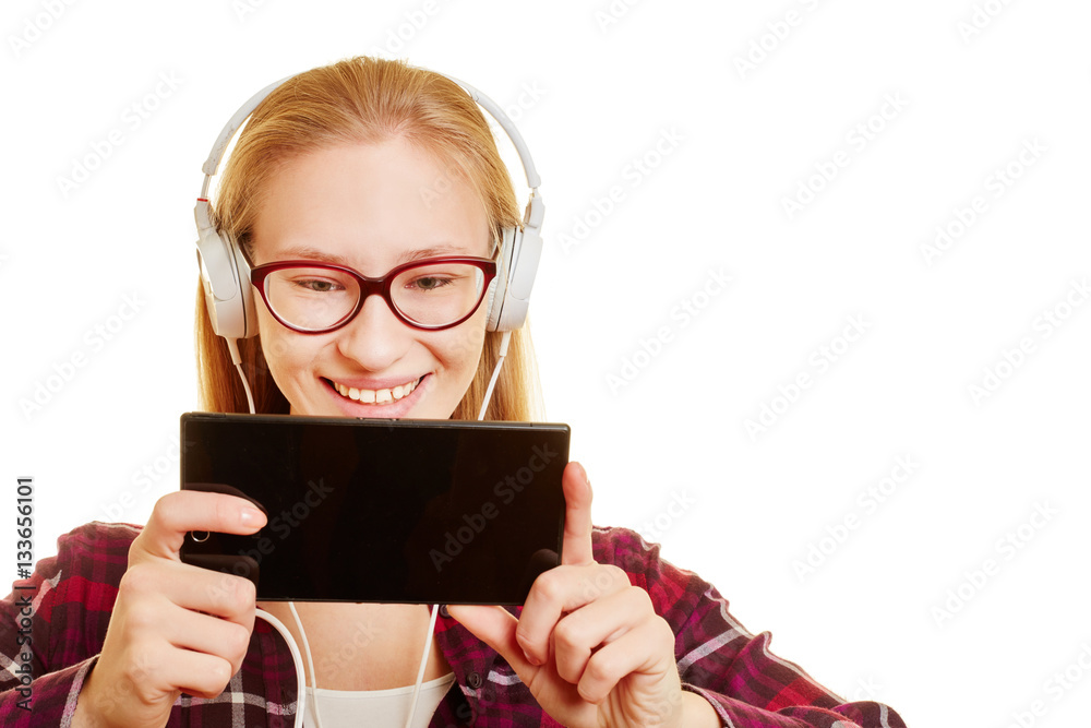 Woman with smartphone and headphones
