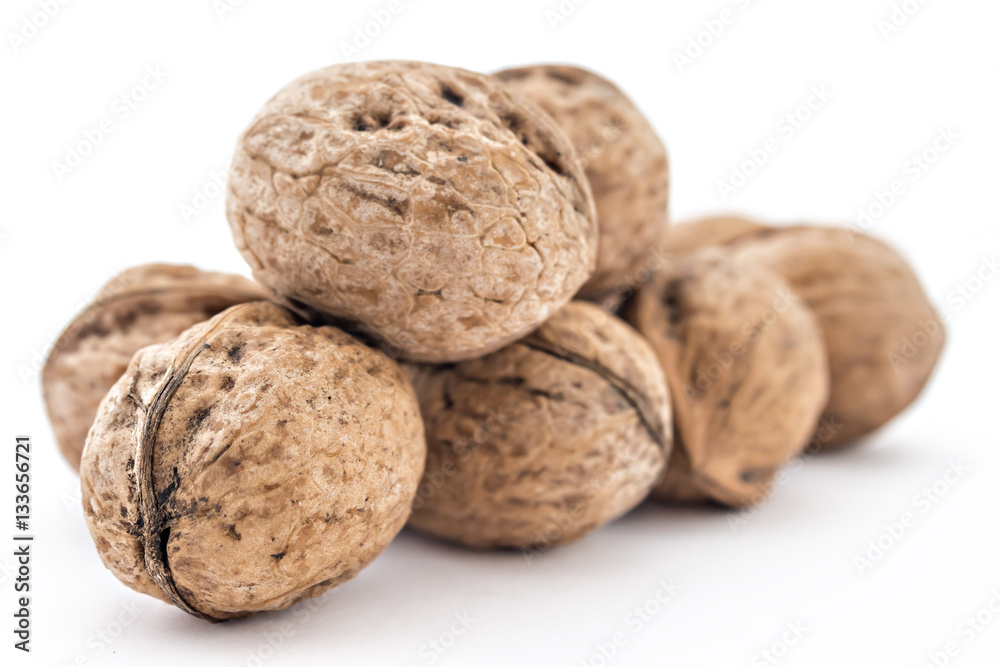 Assortment of dried walnuts isolated on the white background Assortment of dried walnuts isolated on the white background