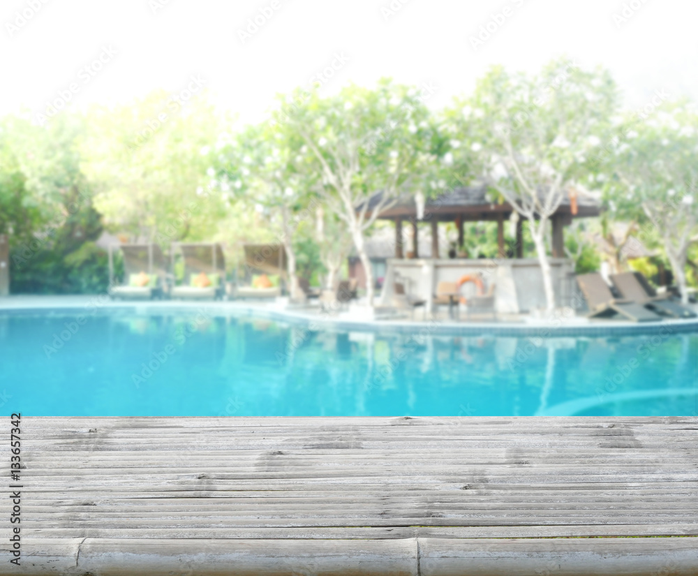 Fototapeta premium Wood Table Top Of Background And Pool