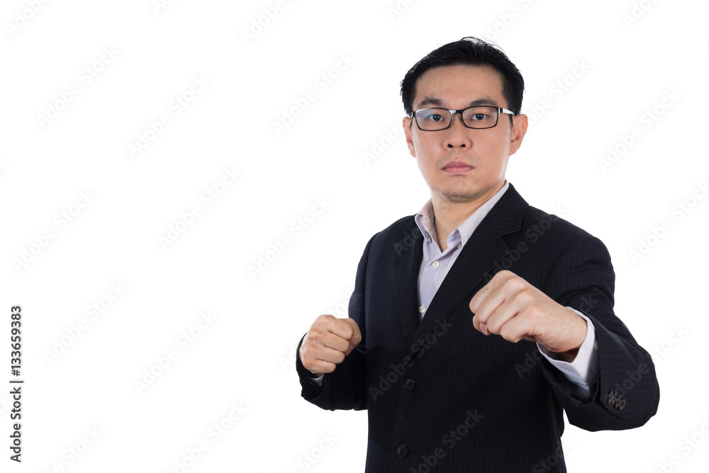 Angry Asian Chinese man wearing suit and holding both fist Angry Asian Chinese man wearing suit and holding both fist