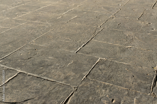 Gray stamped concrete slate seamless texture pattern, pavement outdoor, decorative appearance colors and textures of paving slate stone tile on cement patio design, perspective