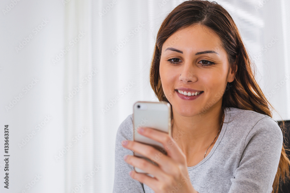 Curious Girl Looking at Her Phone Curious Girl Looking at Her Phone