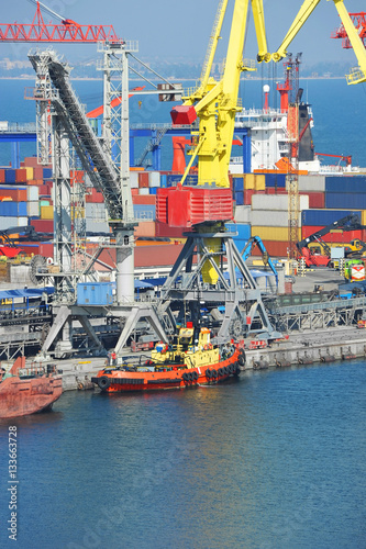 Cargo crane and tugboat