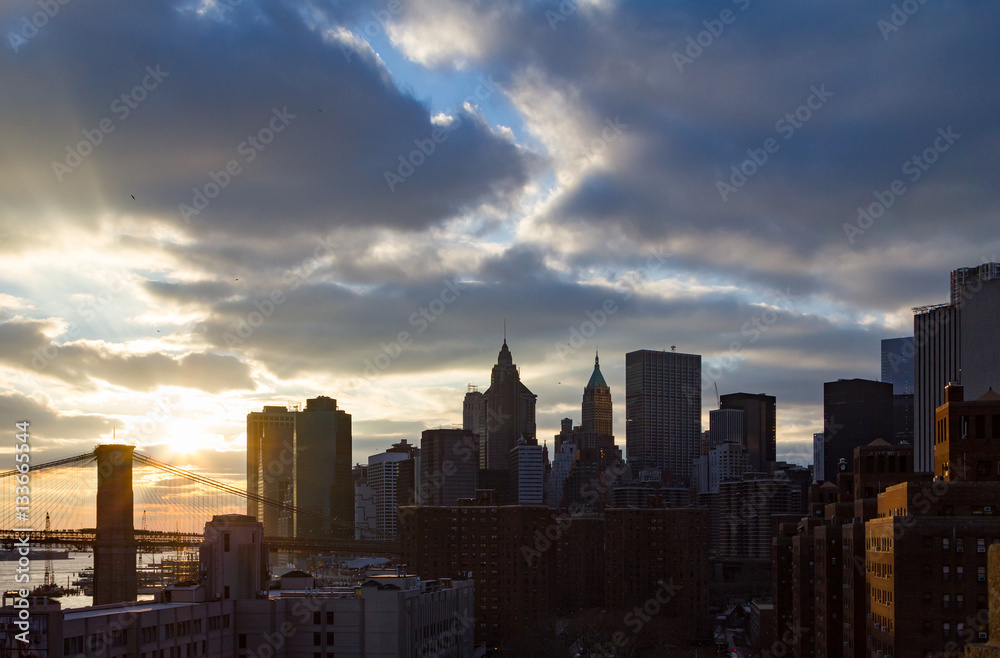 Sunset Behind New York City Skyline Skyscrapers at Dusk