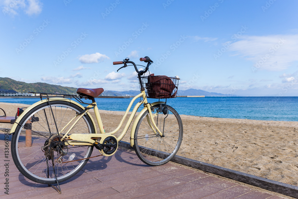 Fototapeta premium Bike at seaside with sunshine