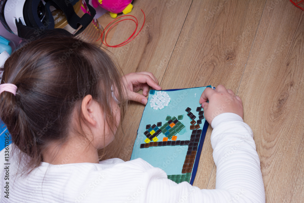 Girl doing applique. Girl doing applique.