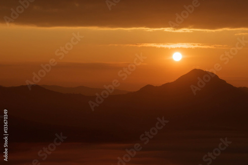 Sunrise  mountain and fog landscape with warm tone  for graphic