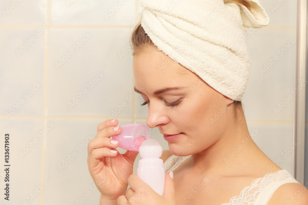 Woman holds stick deodorant cosmetic in hands Woman holds stick deodorant cosmetic in hands