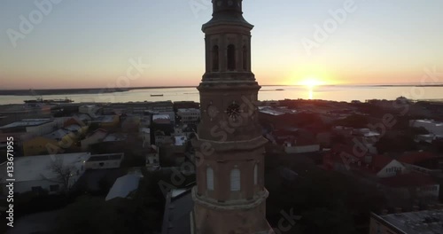 Aerial of downtown Charleston sunrise with Saint Philip Church in the foreground. photo