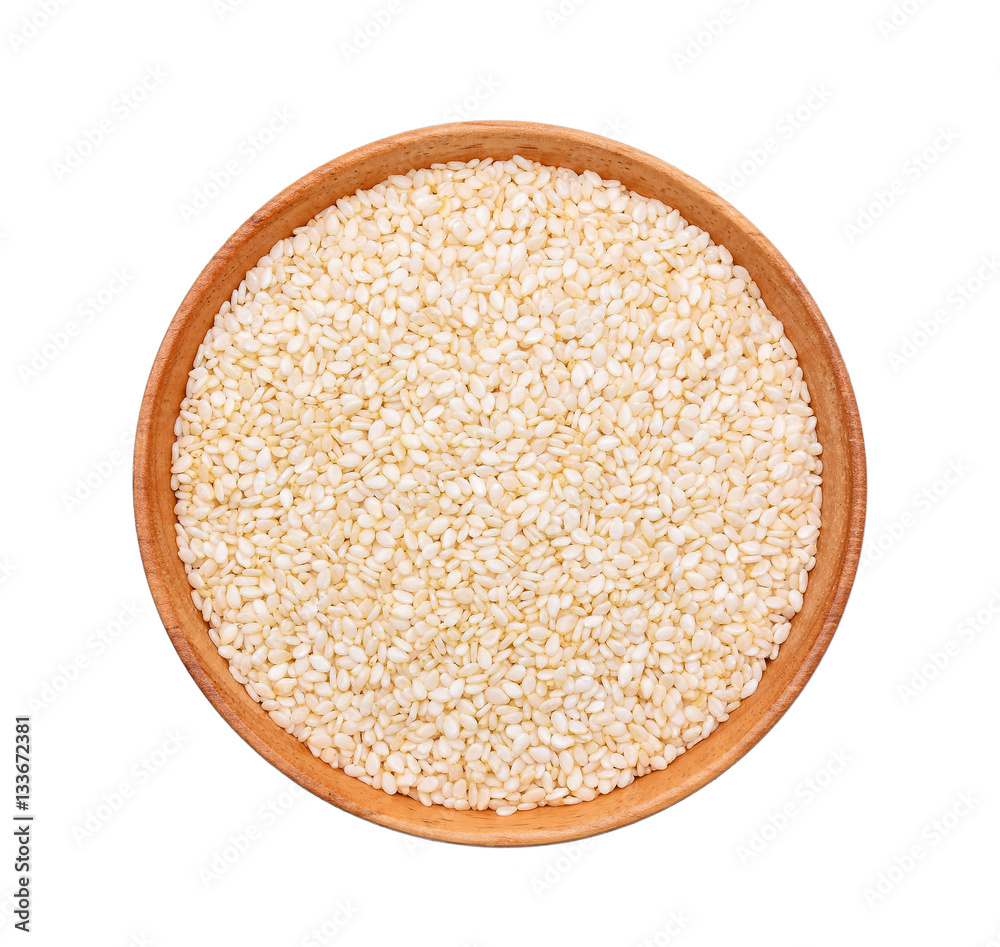 white sesame in wooden bowl on white background white sesame in wooden bowl on white background