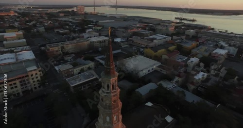 Aerial of downtown Charleston sunrise with Saint Philip Church in the foreground. photo