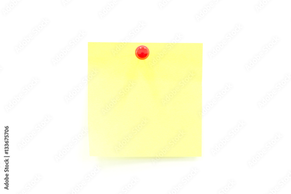 Yellow sticky notes with push pin on white