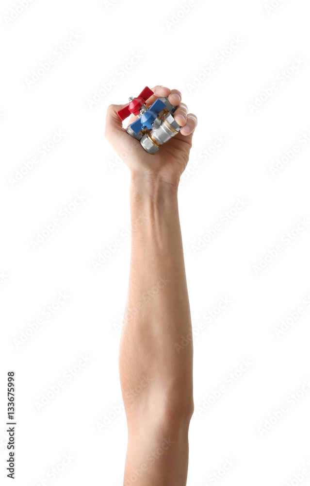 Valves  in man's hand  isolated on white